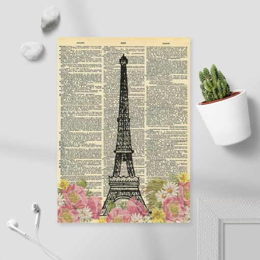 Plakat z kartką z encyklopedii i wieżą Eiffla w kwiatach